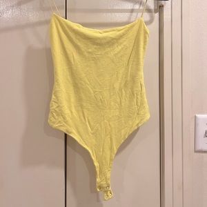 yellow bodysuit